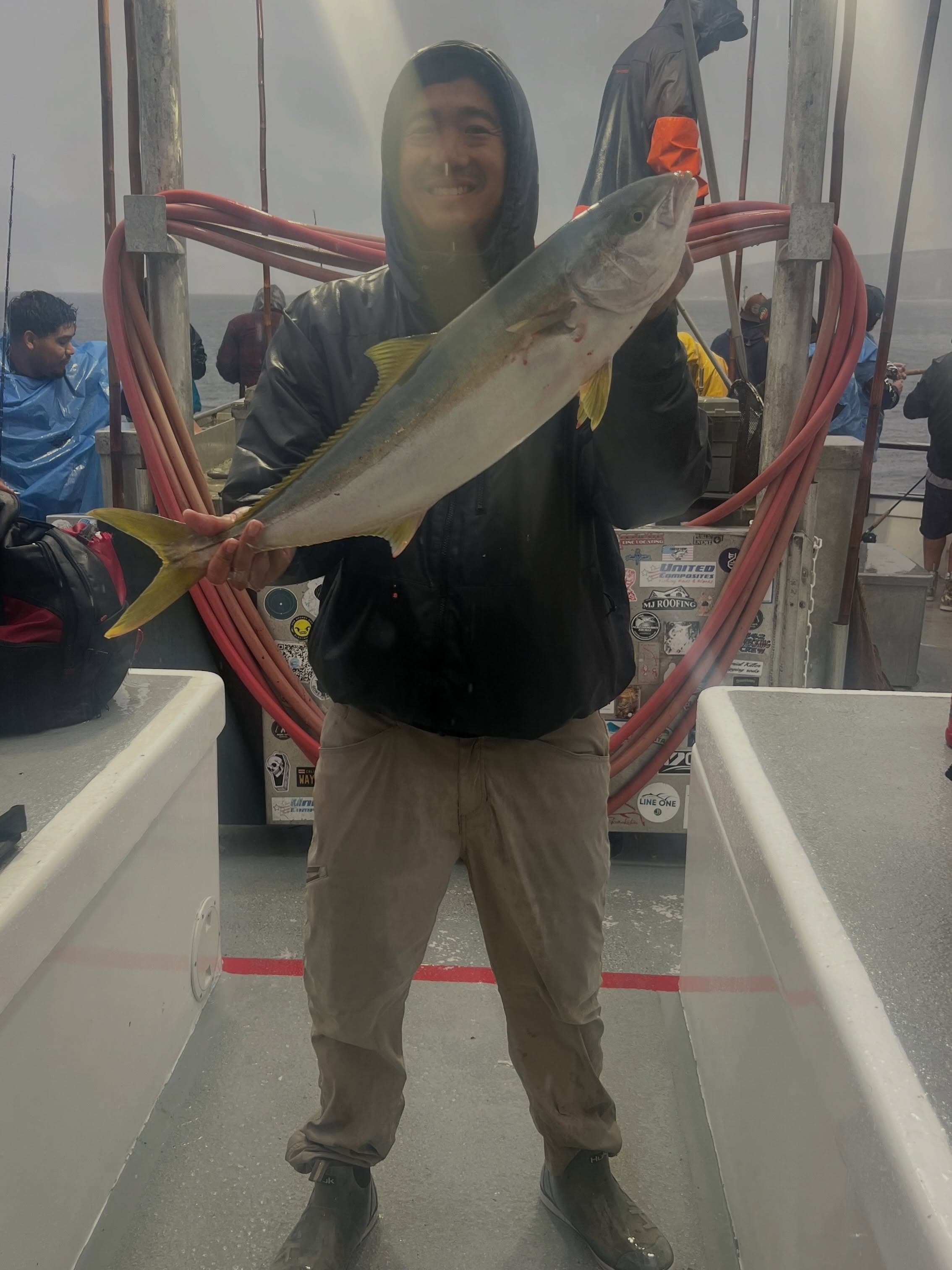 Rain doesn't stop yellowtail and rockfish bite