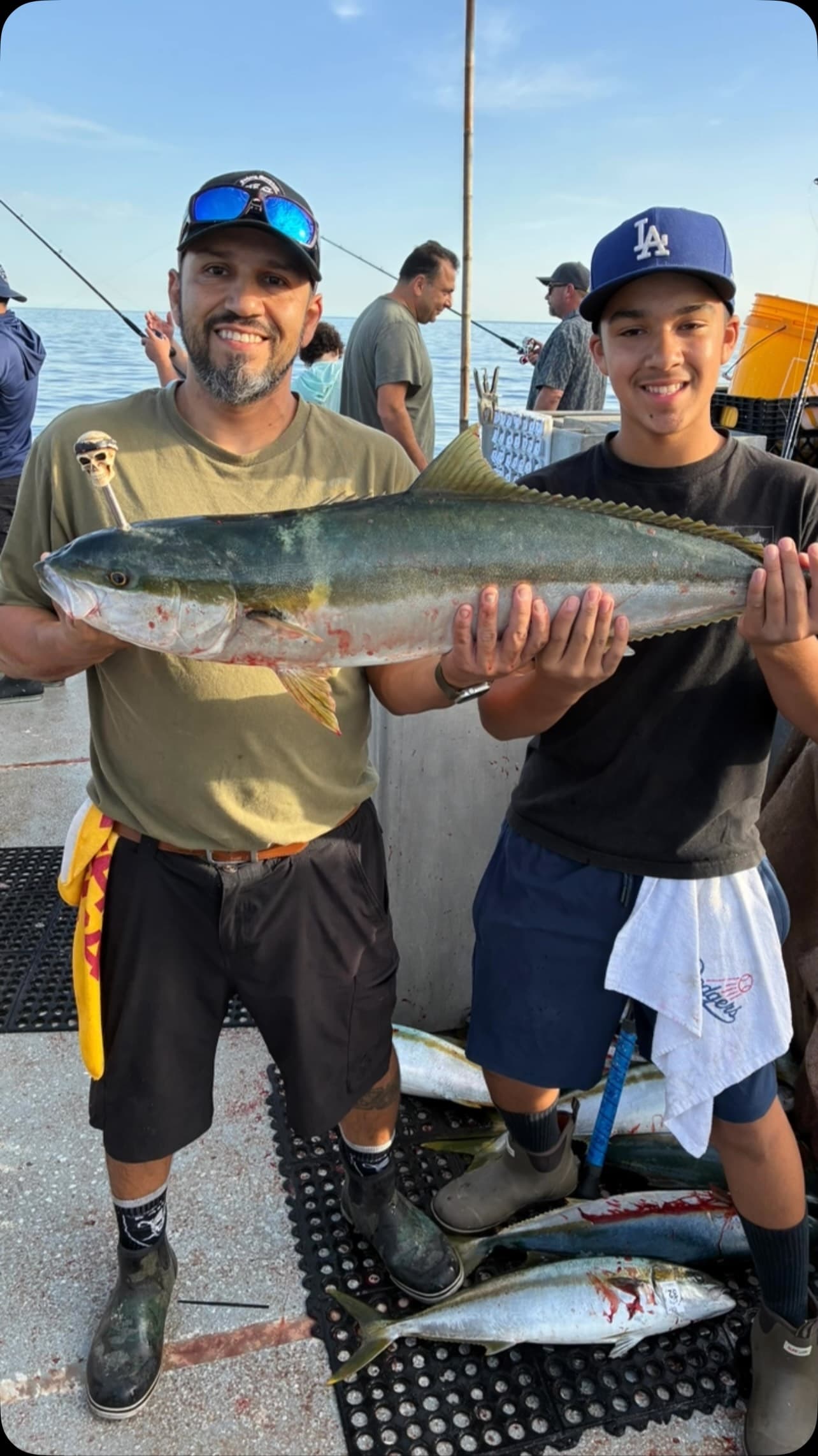 Yellowtail on deck for happy anglers